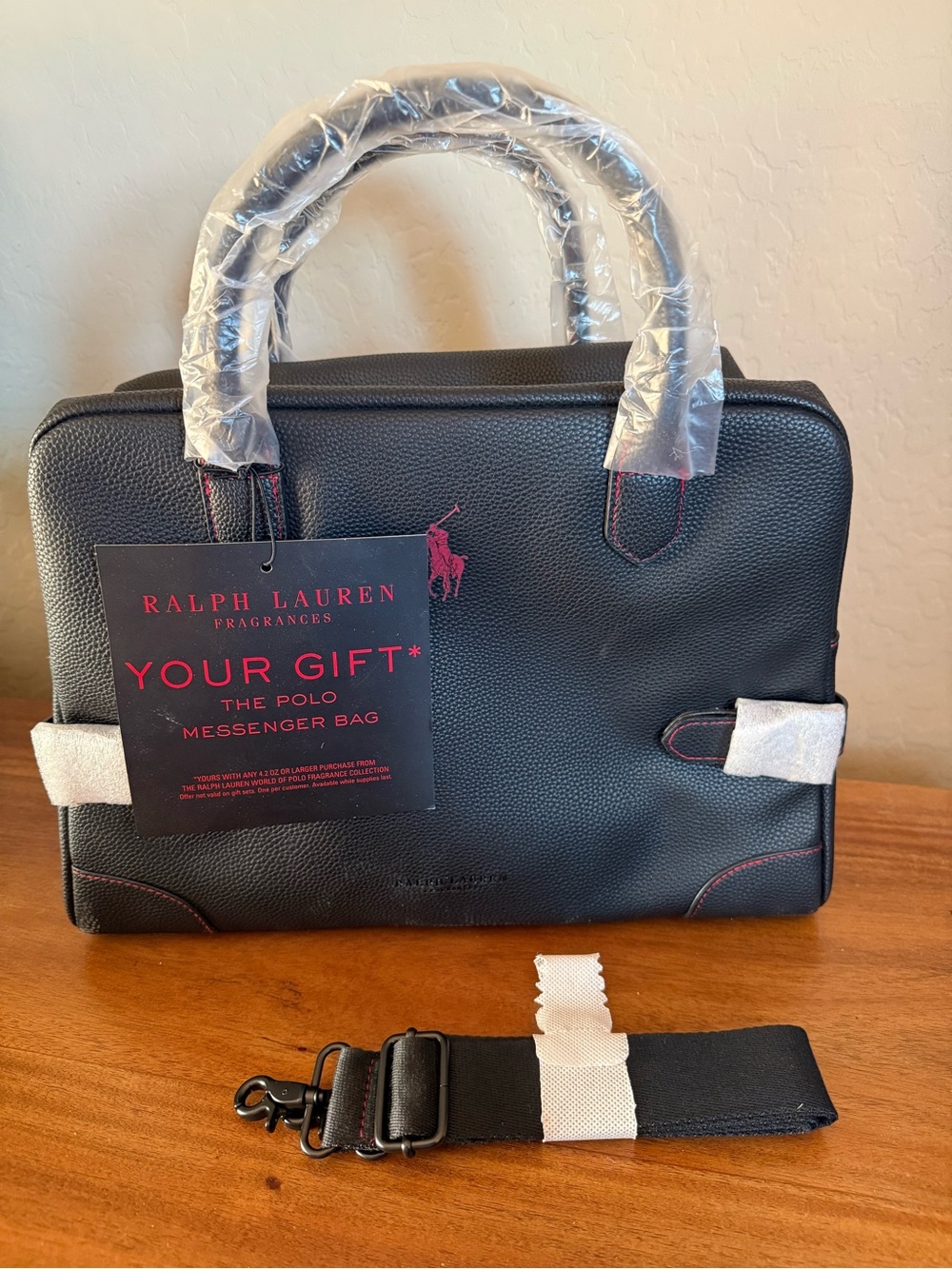 Ralph Lauren Fragrances black faux leather messenger bag